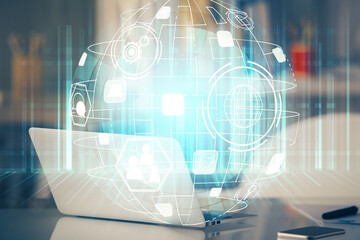 Computer on desktop with social network theme icon. Multi exposure. Concept of international connections.