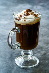 Homemade Alcoholic Amaretto Coffee with Cognac and Whipped Cream.