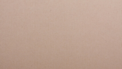 The texture wallpaper of a brown paper cardboard.