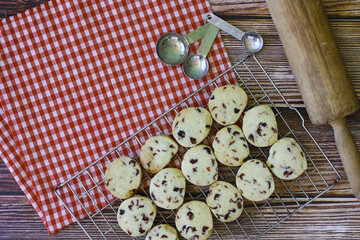 Cookies shortbread, measuring spoons, dough rollers on the table. for the bakery background. copy space for text.
