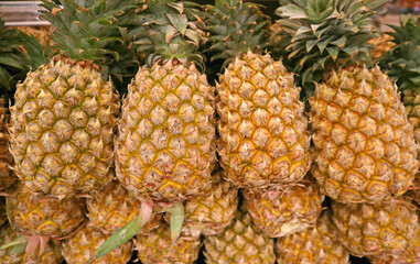 Heap of Fresh Ripe Pineapples for Sale at the Market