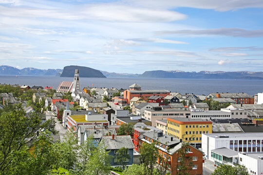 Town of Hammerfest with the downtown area, and cathedral with mountains & fjords in the background. Hammerfest is the northernmost town in the world with more than 10,000 inhabitants, county, Norway.