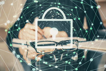 Multi exposure of woman's hands making notes with lock icon. Concept of security and protection of data