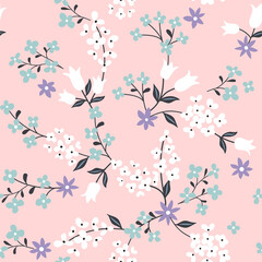 Seamless surface repeat vector pattern with white, blue and purple flowers and leaves on a pink background