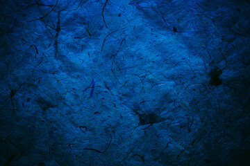 Deep blue abstract texture and background made with recycled paper. 