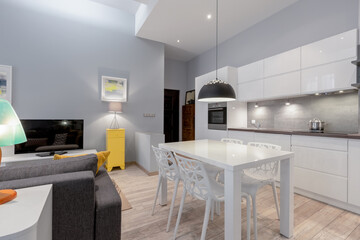 Living room with kitchen and dining area