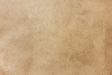 Fototapeta na wymiar Light beige fabric texture. Empty pale beige colour surface design, sackcloth material template. Seamless light brown cloth background with empty copy space, close up top view