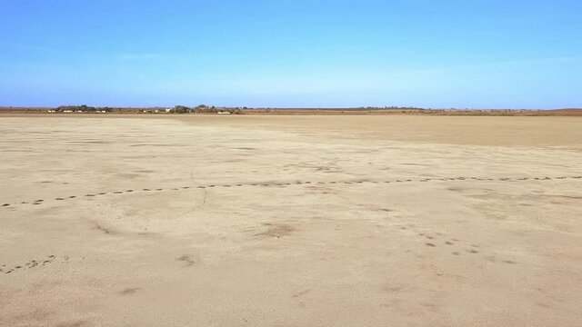 Aerial interior view of dried up salt pans a remote desert environment in an extreme terrain Landscape interior
