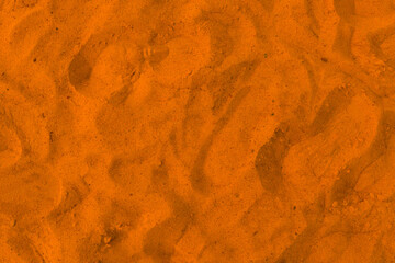 Sandy beach background. Detailed yellow sand texture.