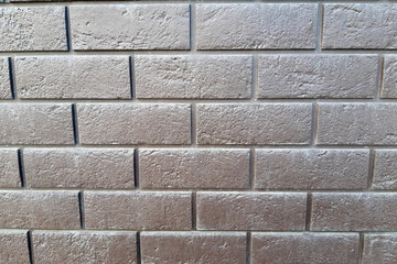 old brick stone wall of a residental building	