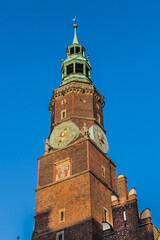 Architectural Details of Town hall tower (Stary Ratusz) on Market square in Wroclaw Old Town. Gothic town hall built from XIII century - one of main landmarks of Wroclaw city. Lower Silesia, Poland.