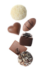 Different chocolate candies falling on white background