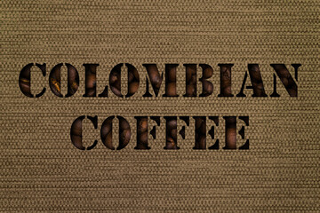 Varieties of Colombian coffee text made up of coffee beans on a background of canvas fabric