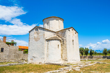 Fototapeta premium Croatia, medieval church of Holy Cross and archaeological site in town of Nin in Dalmatia, popular tourist destination