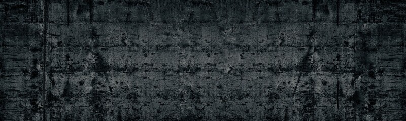 Black old shabby concrete wall wide texture. Aged cement surface. Dark long grunge background