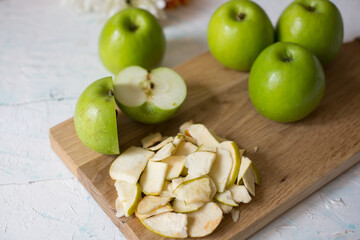 green apples on a wooden table