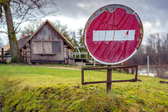 European stop sign in a rural area
