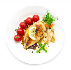 Grill Chicken breast  or chicken steak with black peppers sauce topped black peppers decorate asparagus,oyster mushroom,tomato and lemon carved style  top view isolated on white background