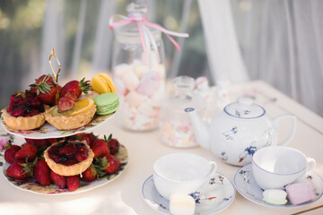cupcakes with cream and berries