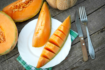 Juice pieces of melon on plate