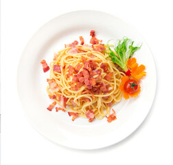 Spaghetti stir fried with bacon on top bacon crispy