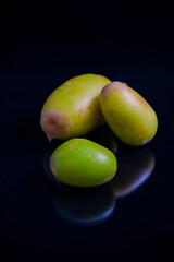 fresh new potatoes isolated on black background