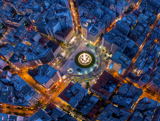 Omonia square at Athens on night twilight time. Aerial view, look down with streets light and traffic