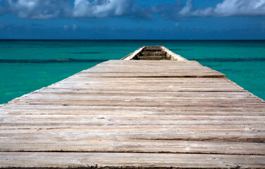 View from the pier and beautiful caribbean sea with blue sky.