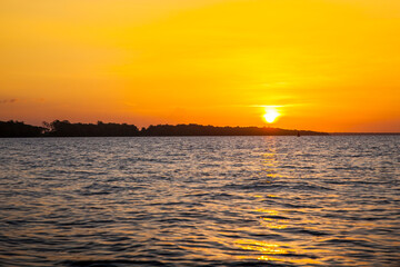 Sunset over the estuary of the Suriname river, Suriname