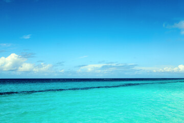 Fototapeta na wymiar Beautiful caribbean sea and blue sky .Summer ocean landscape as background.