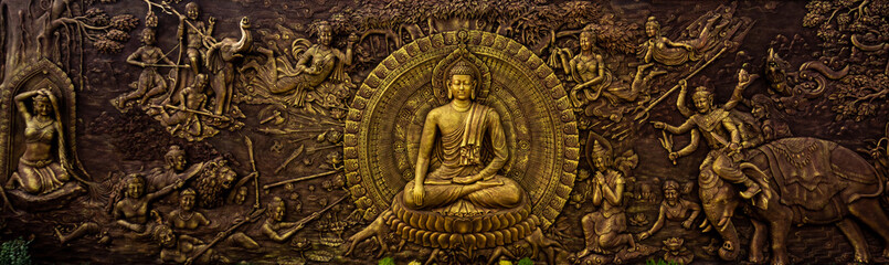 buddha ornament on the wall at vihara dharma shanti tanjung uban - obrazy, fototapety, plakaty
