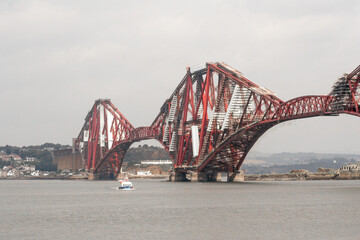 Edinburgh, Scotland. Painting, maintenance and repair works in the Forth Rail Bridge, as seen from South Queensferry