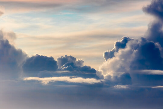 Cloud border background image. Real low bank of fantasy looking dark clouds for art graphic resource.
