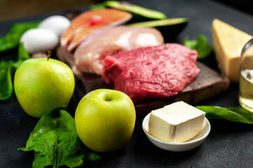 Healthy low carbohydrate foods on stone background. Healthy eating