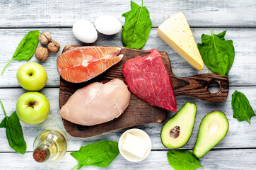 Healthy low carbohydrate foods 
on wood background . Healthy eating.
