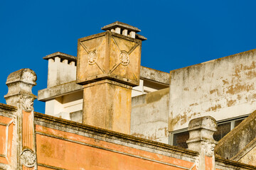 Olhao, Algarve / Portugal - May 15 2019: Traditional wall and pediment decorated with geometric patterns from the Algarve