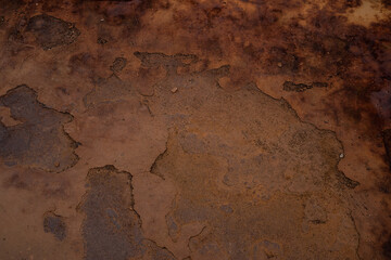 textured and embossed surface in brown, earth and rusty tones