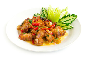 Thai food stir-fried crispy pork spicy and Thai basil served