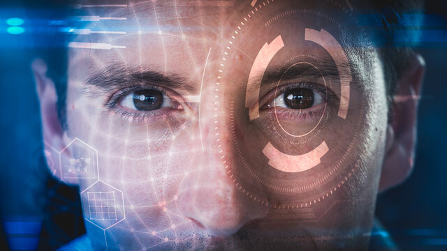 The double exposure image of the businessman facial image overlay with futuristic hologram. The concept of modern life, technology, iris scanner and internet of things