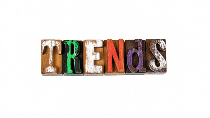 TRENDS. Colored wooden letters on a white background