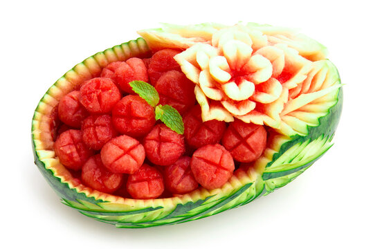 Watermelon decorated carving bowl flower style with fresh round watermelon inside to party fruit time on summer top view isolated on white background