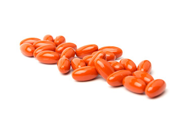 Coenzyme q10 supplement capsules close-up on  white background