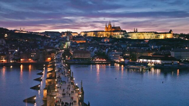 sunset over Charles Bridge and Prague Castle, Czech Republic