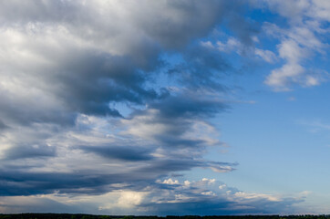 Dramatic sky with stormy clouds. Epic beautiful clouds