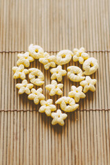 Breakfast cereal laid out in the shape of a heart. A little romantic gesture for a loved one
