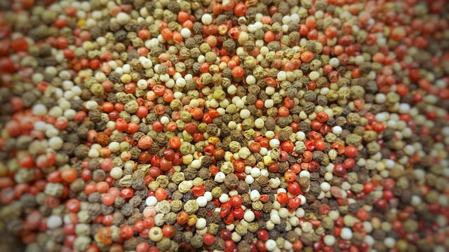 Pepper seeds background.Blurred picture border. Spices for cooking