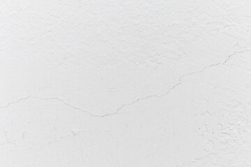 Blank concrete white rough wall for background. Beautiful white wall with cracks and dirty.