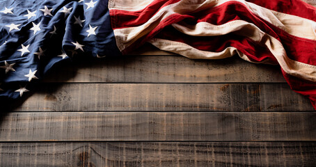 Happy Independence Day. American flags against old wooden background. July 4.