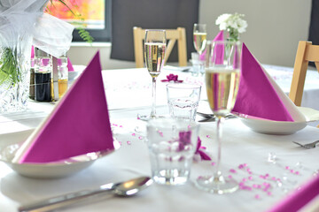 Romantic festive wedding table set in pink color