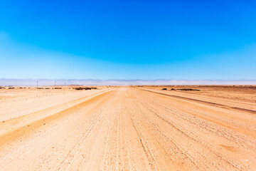 Fototapeta premium A gravel road in Namibia